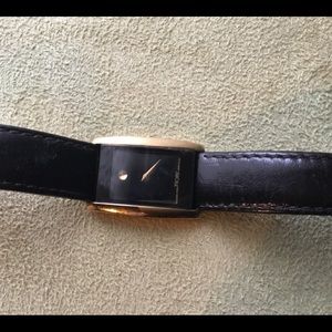 Lady watch. Nicely used. Black leather bracelet